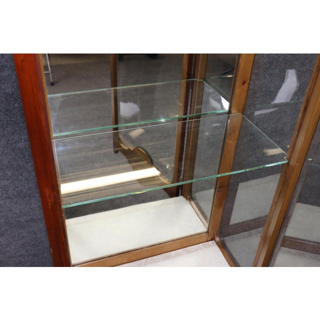 Elevate your interior with this exceptional François Linke style bronze-mounted vitrine, a masterful display cabinet that...