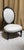 This is a very nice mid 19th Century Victorian antique ebonised chair standing on white porcelain castors and covered in...
