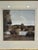 An elegant framed landscape print by Trowbridge, featuring a serene countryside scene rendered in a beautifully subdued,...
