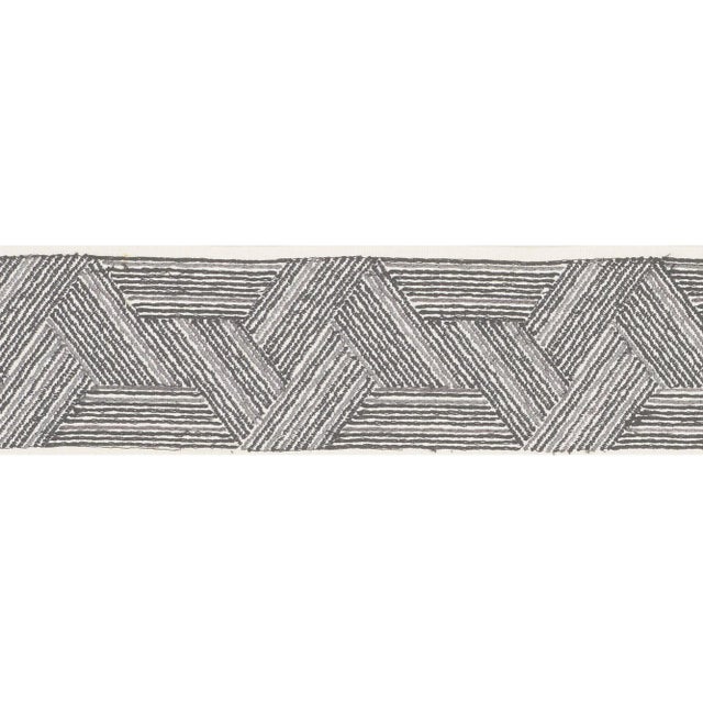 This embroidered tape combines the allure of handcraft with the graphic punch of geometry striking a balance that's just...