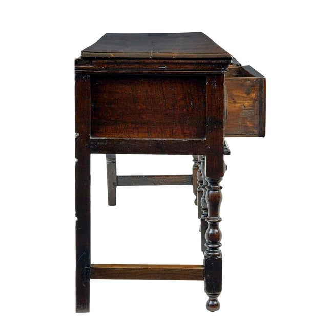 18th century georgian oak dresser base circa 1750. Good quality english oak dresser base. 2 plank top with moulded edge,...