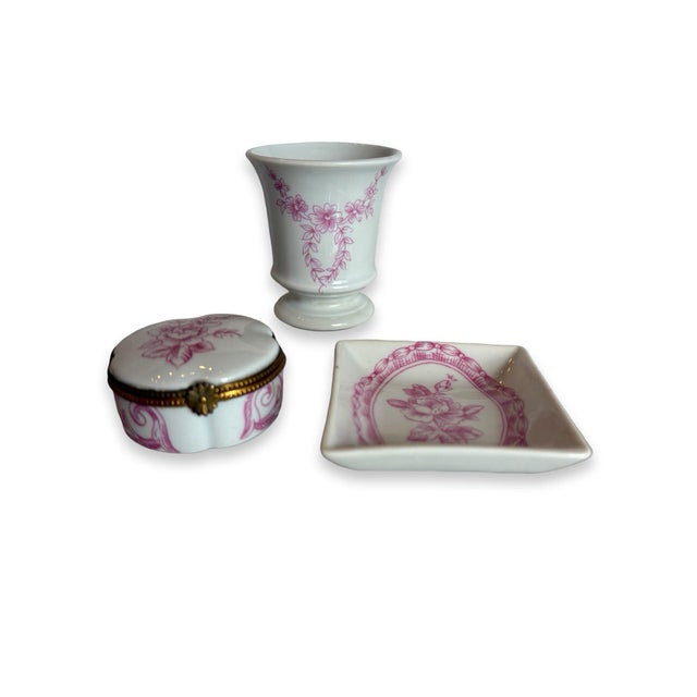 Three darling little pieces of French porcelain, all decorated with delicate pink roses on creamy white Limoges porcelain....