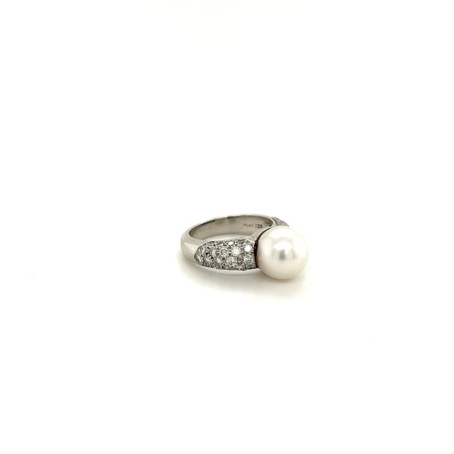 Introducing this mesmerizing Southsea 9.5mm Pearl with amazing iridescent color and luster. Adorned with 46 round cut...