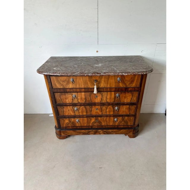 19th Century Neoclassical Commode from south France burl walnut, with marble top, the wood has been finished with a...
