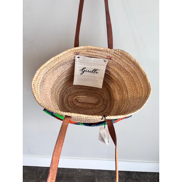 A Giselle Handwoven Straw Basket / Tote Featuring a Large Bow Made From Colorful Print and Brown Leather Shoulder Straps. For Sale - Image 4 of 12