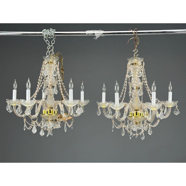 Venetian Style, Pair of Large Russian Cut Crystal Chandeliers, Brass, Crystal, Italy, 1960s A fine pair of Venetian-style...