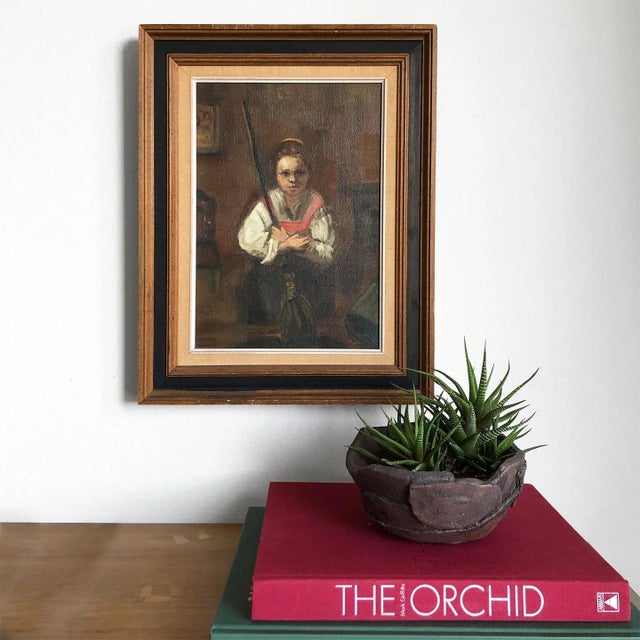 Curious impressionist oil on canvas painting of a young girl who appears to be in traditional European attire. The subject...