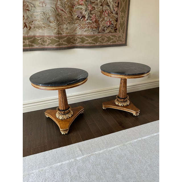 An exceptional pair of late 20th-century tables crafted in the elegant Biedermeier style, showcasing a refined balance of...