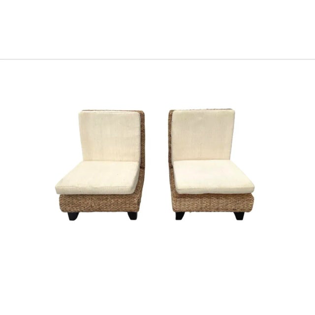 Pair of excellent wicker slipper chairs with thick cream colored back and seat cushions(included) and four short sturdy...