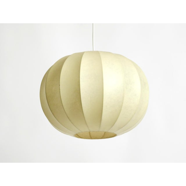 Beautiful small 1960s cocoon pendant lamp in very good original vintage condition. great minimalist design. Creates a very...
