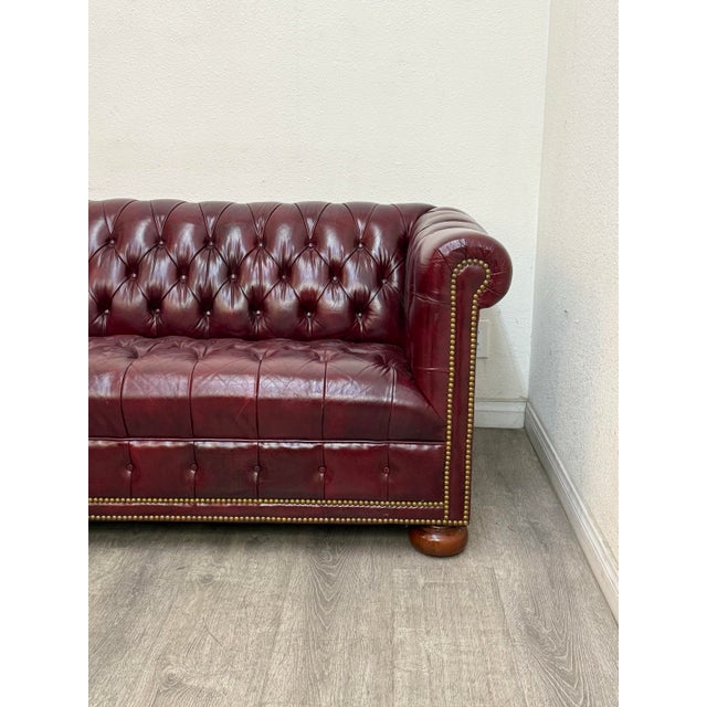 Beautiful Oxblood red leather chesterfield sofa in good condition