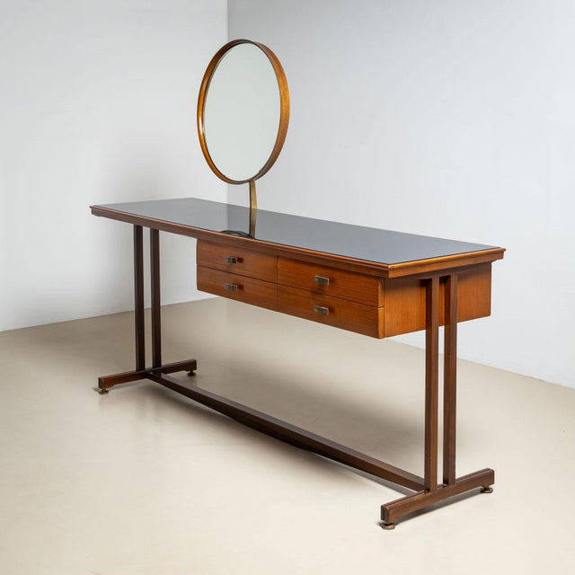 An elegant Italian Mid-Century dressing table attributed to Silvio Cavatorta (1899-1957), crafted in the 1950s. The table...