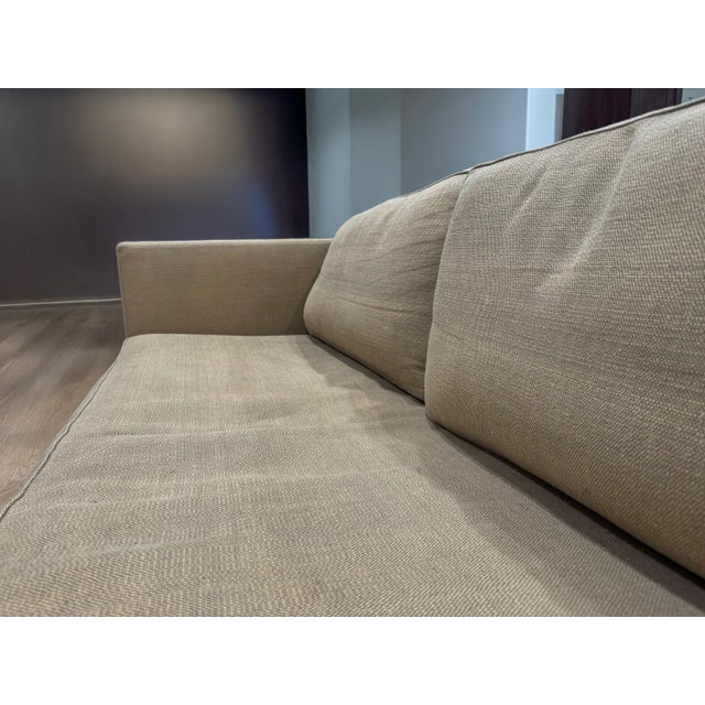 Authentic Christian Liaigre sofa sold at Holly Hunt. Originally retailed for about $12,000. Solid wood frame with woven,...