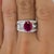 Platinum ring with 2.71 carat AGL certified Burmese pinkish red ruby and 1.68 carats of round marquis and baguette cut...