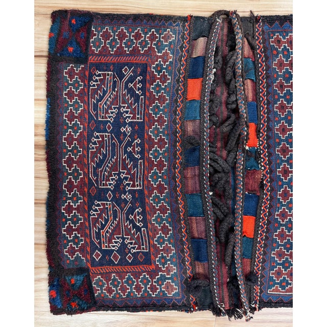 Vintage heavy Moroccan woven wool camel saddle blanket. Both sides displayable, one featuring a contrasting stripe and the...