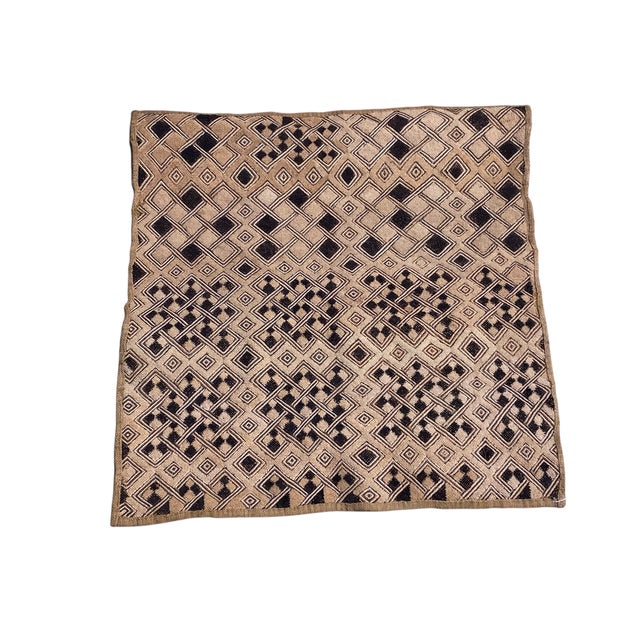 This vintage Kuba Kasai Velvet Boutallah raffia textile from Zaire, Africa, with a geometric pattern hand woven from...