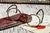 Step back to the whimsical elegance of the 1920s with this rare and endearing pair of eyeglasses, an enchanting relic from...