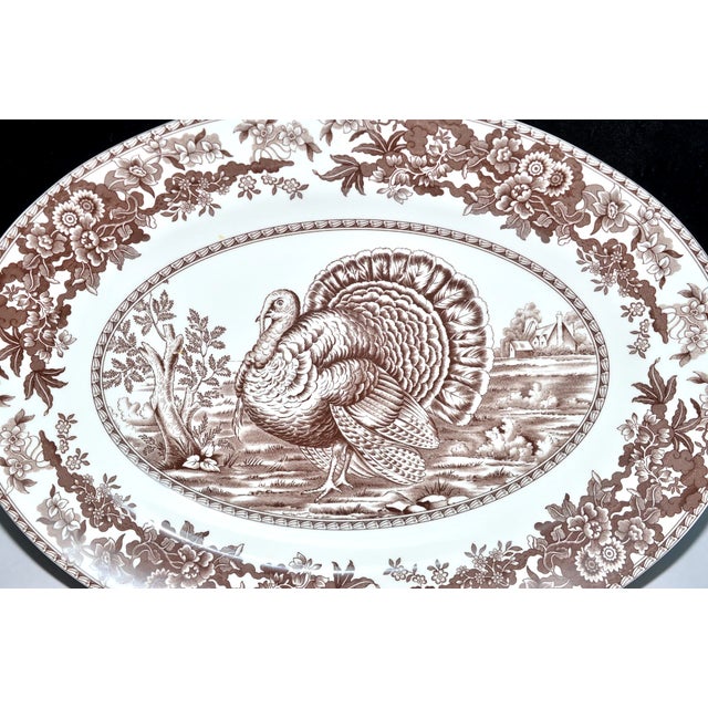Bring classic autumn charm to your table with this beautiful **Spode Fall Celebration Turkey Oval Platter**. Featuring a...