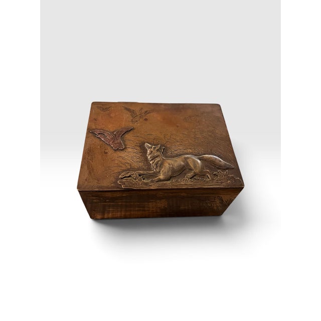 Exceptional antique Japanese mixed-metal decorative box dating to the late Meiji period, circa 1890–1912. This finely...