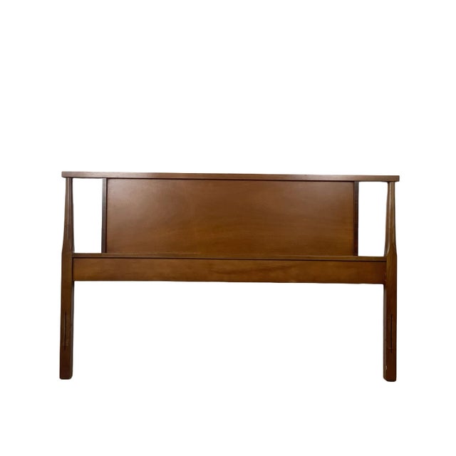 There’s a clean, architectural simplicity to this walnut headboard that makes it endlessly easy to style. A single flat...