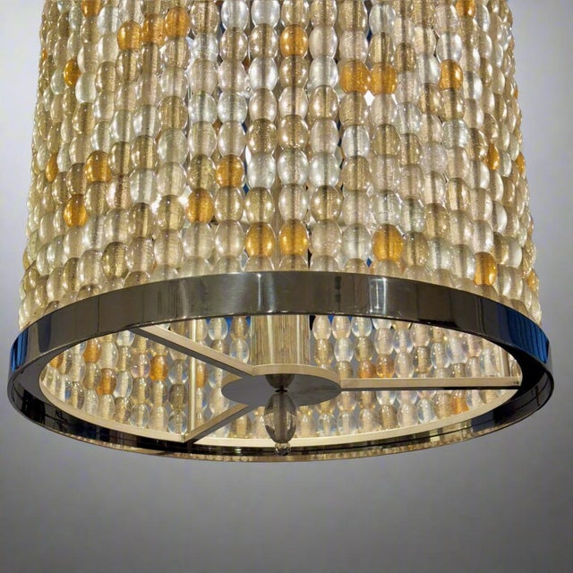 A Contemporary Modernist Lantern designed by Roland Wolff from Germany circa 2020. Crafted in polished nickel with Hand-...