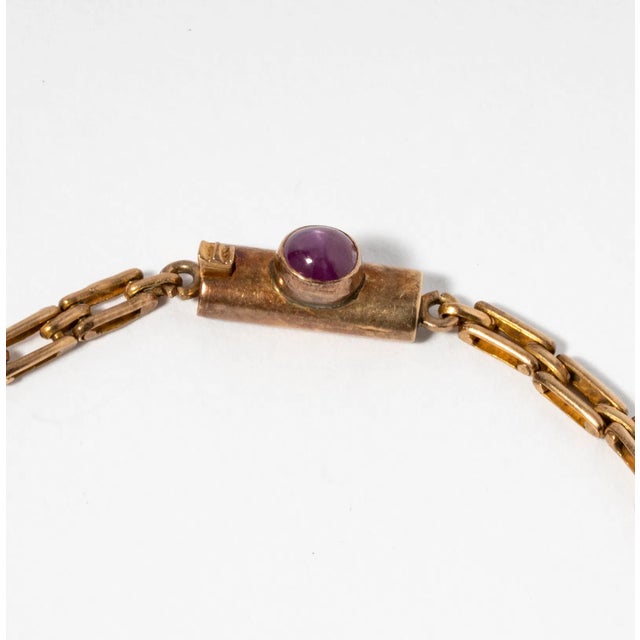 This bracelet embodies the Mid-Century Modern / Retro jewelry design style. Smooth, rounded, polished gems instead of...
