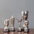 Collection of five 20th century silver plated trophies, re-polished with pine bases. Measurements to the largest. U.K...