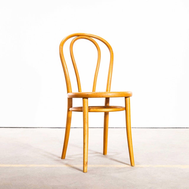 1960’s Original Blonde Hoopbacks with Cane Seat – Set Of Four. Good quality classic bentwood chairs with a mid blonde...