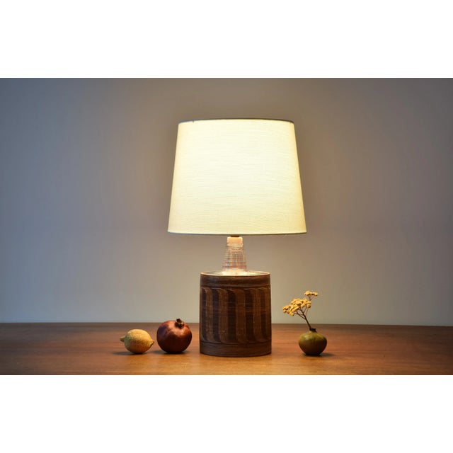 Mid-century Danish table lamp by Danish ceramist Jytte Trebbien. It is from her own studio. Made circa 1960s. The neck and...