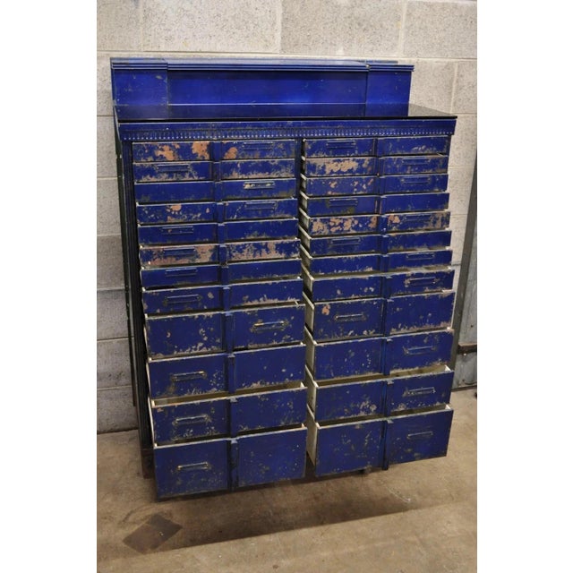 Vintage American Cabinet Co Steel Metal 24 Drawer Blue Dental Medical Cabinet. Item features black glass surface, steel...