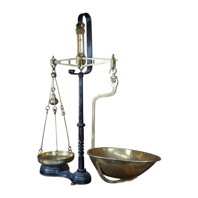 "An antique 4lb. mercantile balance by Bayliss & Co of Birmingham, England. Features a twisted iron stand and brass...
