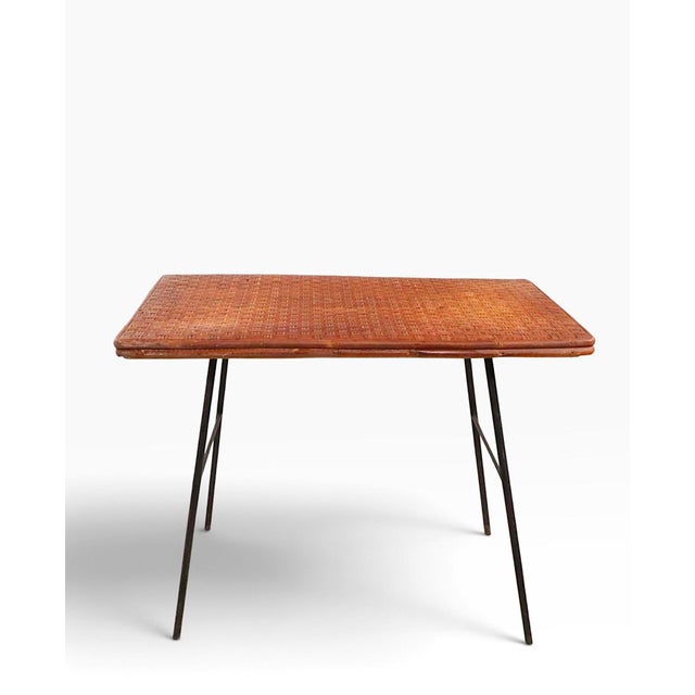 Mid Century wicker mat top, wrought iron base side table, in good, original, clean and ready to use condition, showing...