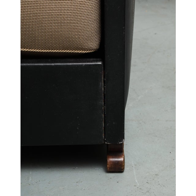 Early 20th Century Maison Jansen daybed features a squared headboard and footboard on a scrolling base veneered in figured...