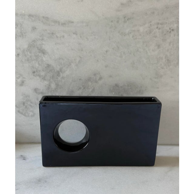 Vintage mid century ceramic vase with gunmetal high gloss glazed finish. Unique rectangular shape with circle cut out....