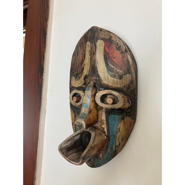 This beautiful hand carved mask is the perfect accent piece for an adventure room or trophy den. Made of heart pine and...