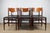 An elegant set of six chairs designed by Gianfranco Frattini in the 1960s, combining a slender teak frame with black vinyl...