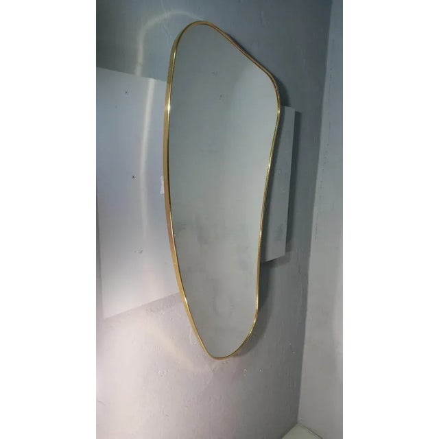 Mid-Century Modern Mirror with Brass Frame in the Shape of a Banana For Sale - Image 3 of 7