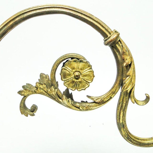 The Art Nouveau wall lamp comes from the beginning of the 20th century. It is in good condition and has a delicate patina....