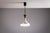 This elegant pendant light by Sölken Leuchten showcases the refined material harmony and craftsmanship typical of mid-...