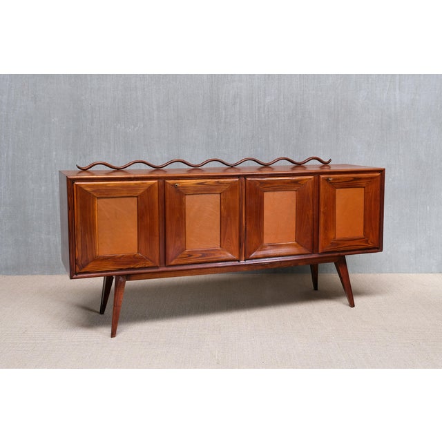 This very rare sideboard was produced in Italy during the 1950s by a master cabinetmaker. While the exact designer remains...