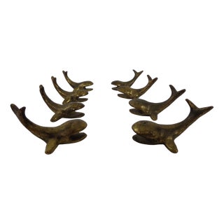 Whale-Shaped Brass Paperweights or Knife Rests in the style of Walter Bosse, Austria, 1950s, Set of 4 For Sale