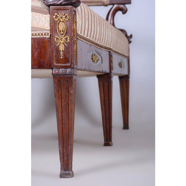 Empire Mahogany Sofa Origin: France 1860s This item features classic Empire elements. This style, originating in 19th...