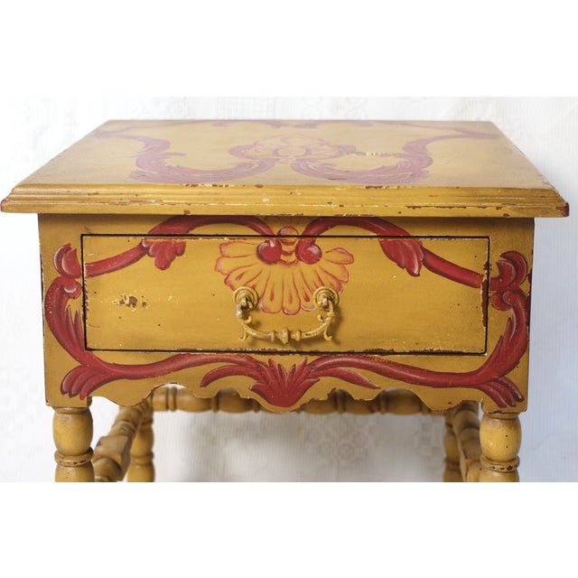 A handpainted table made by Guildmaster. Great yellow and red painted table from the 1990s. Large spacious drawer and the...