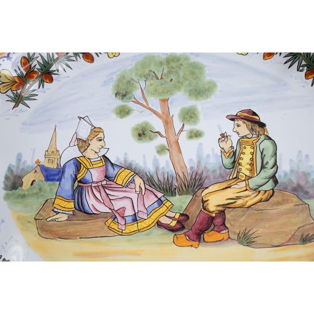 Large 19th-century HB Quimper faience platter beautifully hand-painted in the Porquier-Beau style. Signed. Measures: width...