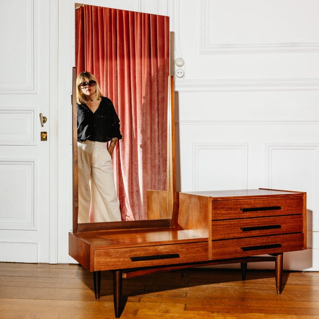 Mid-Century Entryway Vanity/Styling Table, circa 1960. An elegantly proportioned piece crafted from wood and teak veneer,...