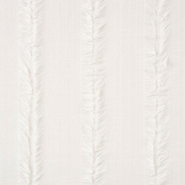 Inspired by a textile in the Schumacher archive from the 1970s, Talos is a wide vertical stripe accentuated by a fringe of...