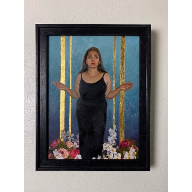 In "Bring Forth Miracles," a figure stands poised against a vibrant blue backdrop, exuding both strength and serenity. The...