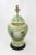 Vintage Temple Jar Lamp is hand painted in a spring green with light yellow decorated rings around the vessel. A red...