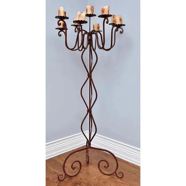 Dramatic hand-forged iron floor candelabra by Jan Barboglio, featuring the designer's distinctive Mexican ironwork and...