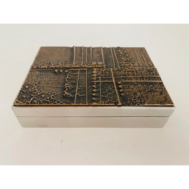 Modernist bronze and steel box by Spanish sculptor Jose Luis Sanchez. Incredible bronze casting that is reminiscent of...